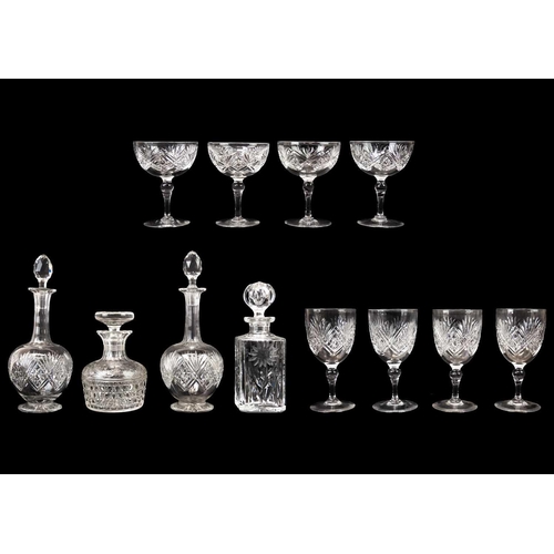 437 - A pair of shaft and globe cut glass decanters and stoppers. 1920s, together with four wines and four... 