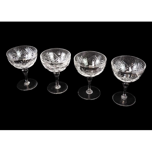 437 - A pair of shaft and globe cut glass decanters and stoppers. 1920s, together with four wines and four... 