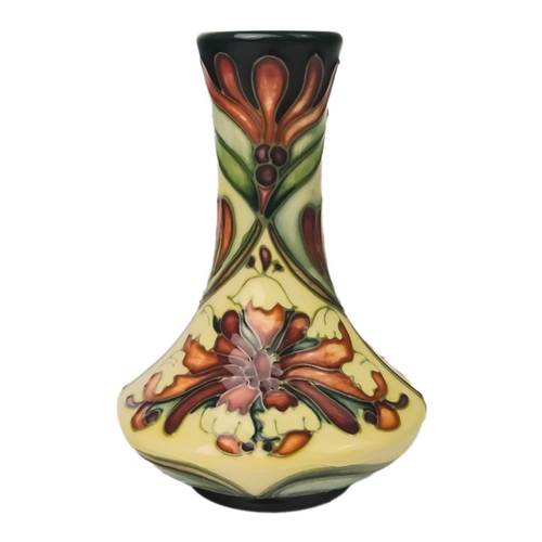 439 - A Moorcroft Florian Dream small vase. Height 11cm, a Waterford crystal clock, and a Royal Doulton su... 