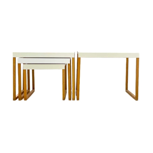 445 - A pair of Habitat Kilo oak framed low tables. With cream enamel tops, height 40cm width 50cm depth 4... 