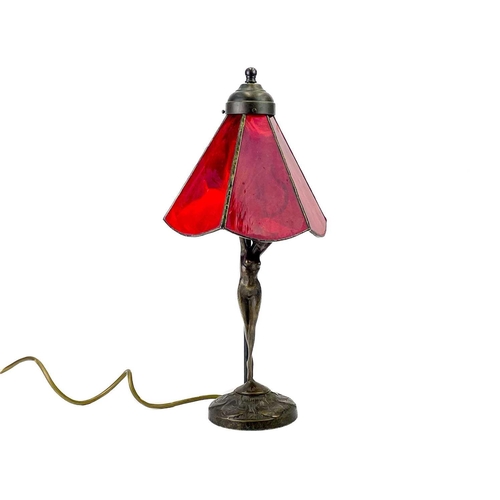 467 - A bronzed metal figural table lamp base after Moreau, modelled with a female nude. With Tiffany styl... 