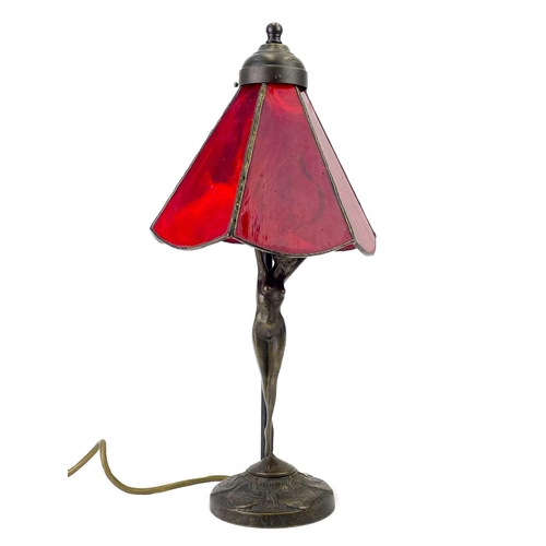 467 - A bronzed metal figural table lamp base after Moreau, modelled with a female nude. With Tiffany styl... 