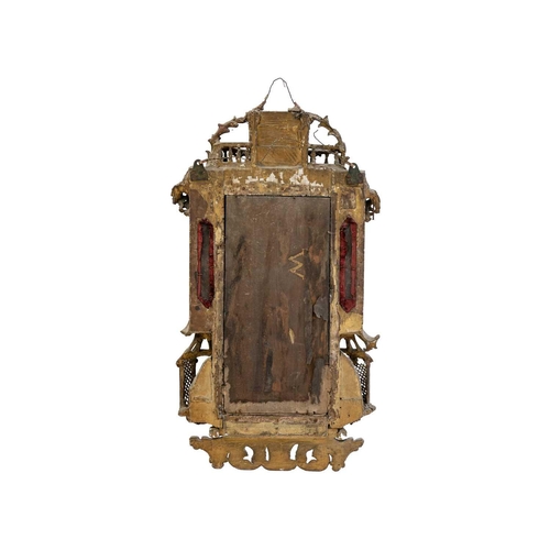 481 - A George III gilt gesso and carved wood wall mirror. In the Chinese Chippendale taste, the galleried... 