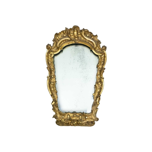 485 - An 18th century baroque wood carved gesso gilt mirror. 77cm x 47cm.