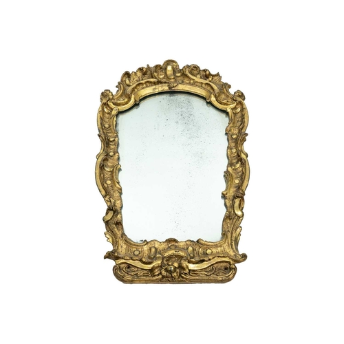 485 - An 18th century baroque wood carved gesso gilt mirror. 77cm x 47cm.