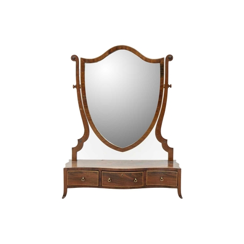 488 - A late George III mahogany dressing table mirror. With a shield shape mirror, the serpentine shaped ... 