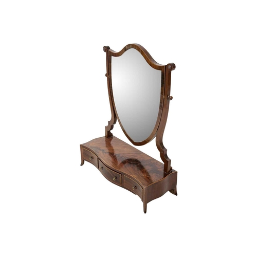 488 - A late George III mahogany dressing table mirror. With a shield shape mirror, the serpentine shaped ... 