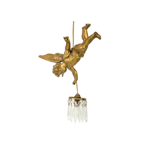 490 - An early 20th century electrolier. In the form of a gilded cherub holding a light fitting with glass... 