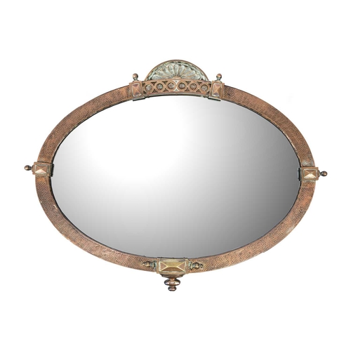 493 - A planished copper oval wall mirror. Early 20th century, with arched top and applied mouldings, 69X9... 