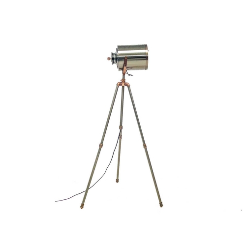 498 - A nautical or studio style standard lamp. Modern, with brushed chrome and copper finish, on a tripod... 