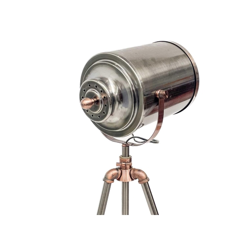 498 - A nautical or studio style standard lamp. Modern, with brushed chrome and copper finish, on a tripod... 