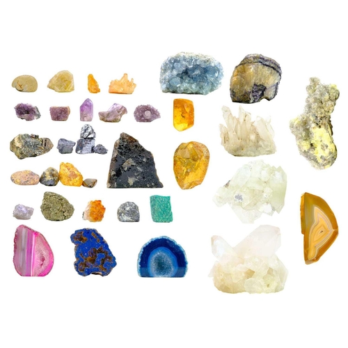 50 - A collection of rough minerals. To include amethyst, clear quartz, quartz clusters, agate, pyrite, e... 