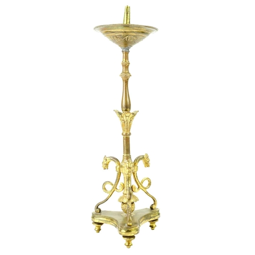 52 - A pair of brass pricket type ecclesiastical candlesticks. With a trefoil base, height 32cm.