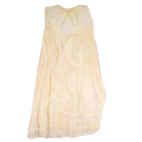 525 - A 19th century infant's silk and lace christening gown. Together with a silk and lace petticoat, and... 