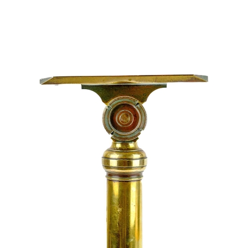 53 - An early 19th century brass telescope stand. With folding tripod stand, height 50cm, together with a... 