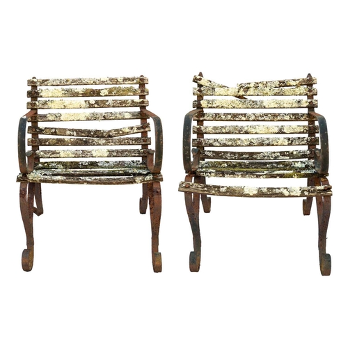 530 - A pair of wrought metal and slatted wood garden chairs. Height 77cm, width 61cm, depth 60cm.