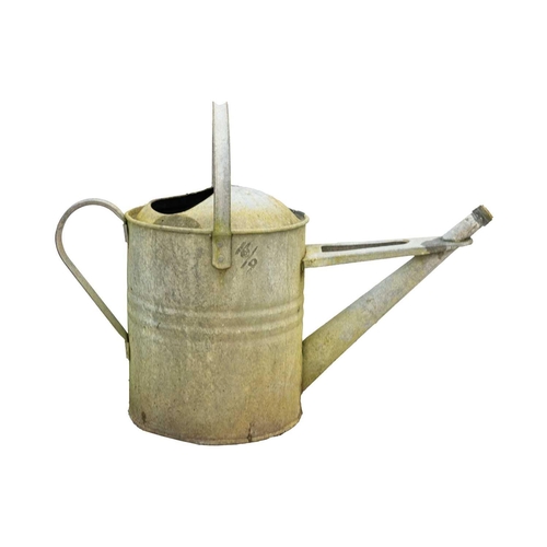 547 - A two gallon galvanised watering can. Together with four others (5). The watering cans are currently... 