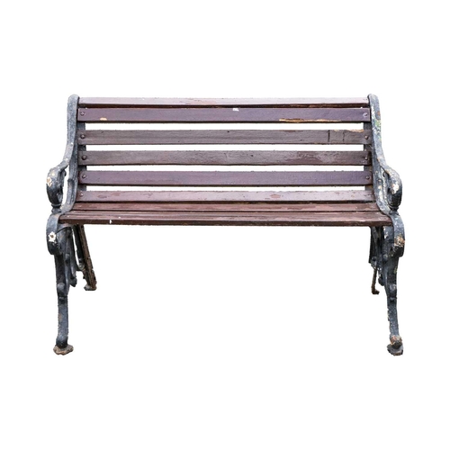 554 - A small cast iron garden bench, width 79.5cm. Together with another garden bench, width 119cm (2).