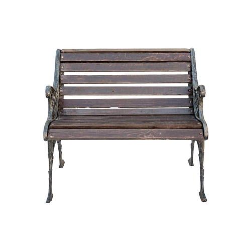 554 - A small cast iron garden bench, width 79.5cm. Together with another garden bench, width 119cm (2).