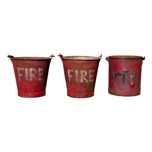 56 - Three red painted metal 'FIRE' buckets. All approximately 32cm tall.