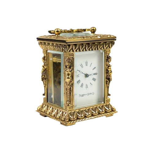 566 - A Mappin & Webb miniature carriage timepiece. Late 20th century, with cast brass case, height 8.2cm.