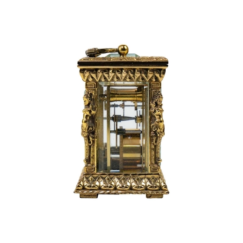 566 - A Mappin & Webb miniature carriage timepiece. Late 20th century, with cast brass case, height 8.2cm.