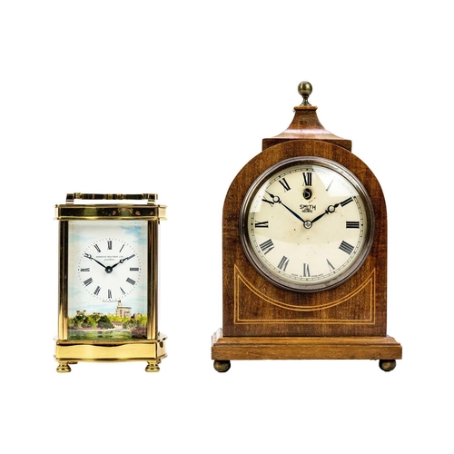 568 - A Diamond Boutique brass cased carriage clock. Circa 1988, the dial painted with a view of Windsor C... 