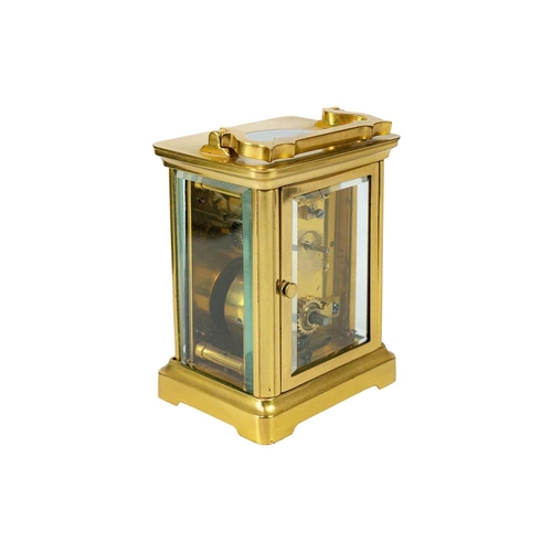 569 - A French brass cased carriage timepiece. With folding handle, contained in a carriage case, height 1... 