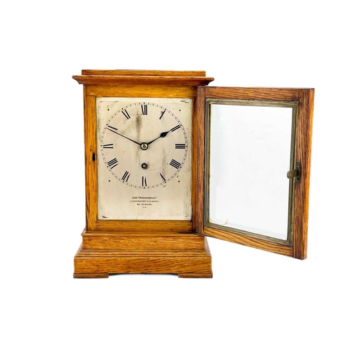 574 - A Charles Frodsham oak four-glass library timepiece. Mid to late 19th century, the silvered dial and... 