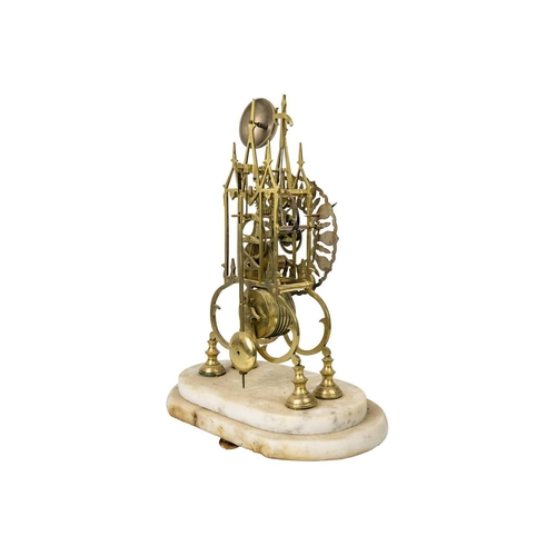 575 - An English brass cathedral skeleton clock. 20th century, with triple steeple open frame, single fuse... 