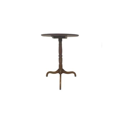 580 - A George III mahogany tripod table. With a dished tilt top, on a turned pillar, height 73cm, diamete... 