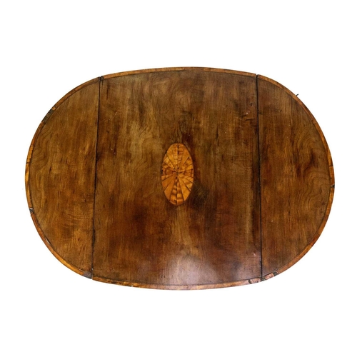 584 - A George III mahogany, satinwood banded and inlaid oval Pembroke table. Fitted an end drawer and rai... 