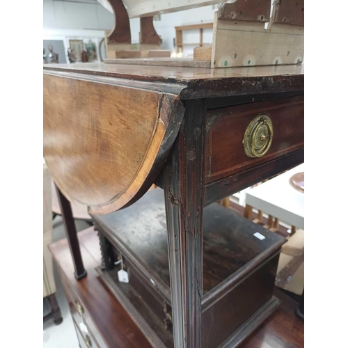 584 - A George III mahogany, satinwood banded and inlaid oval Pembroke table. Fitted an end drawer and rai... 