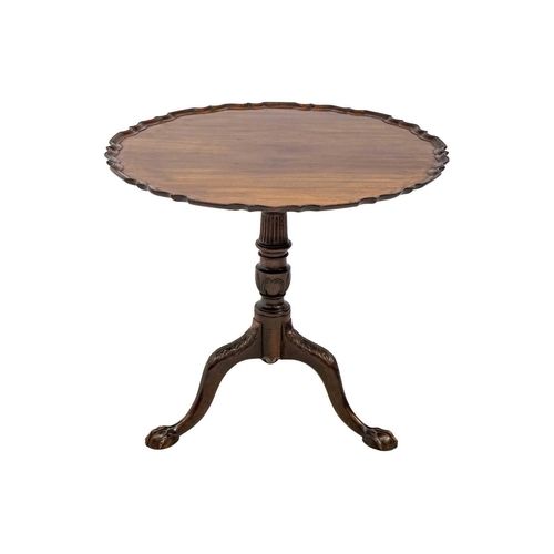 587 - George III style mahogany pie crust tilt top tripod table. 19th century, the turned and fluted pilla... 