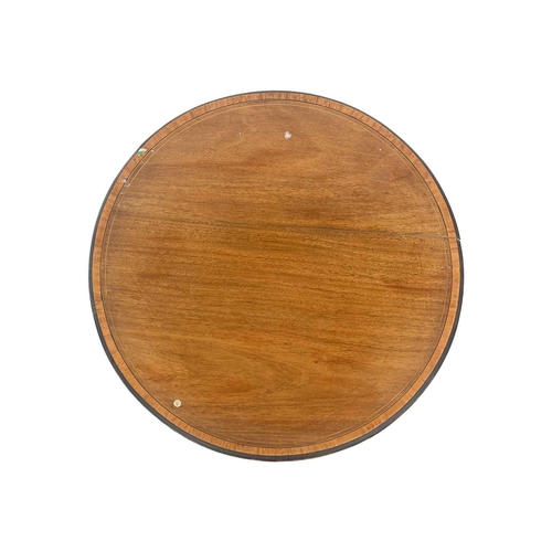 590 - An Edwardian mahogany satinwood crossbanded and boxwood strung inlaid circular occasional table. Rai... 