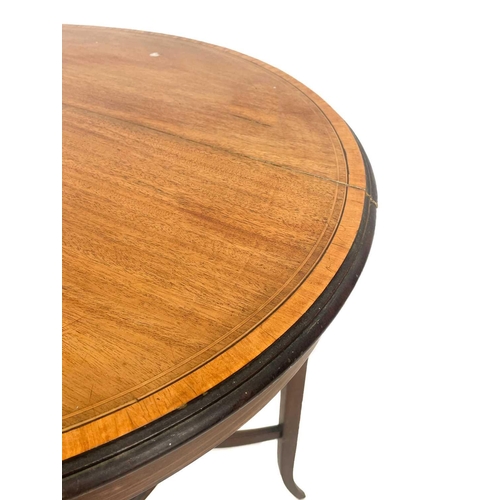 590 - An Edwardian mahogany satinwood crossbanded and boxwood strung inlaid circular occasional table. Rai... 