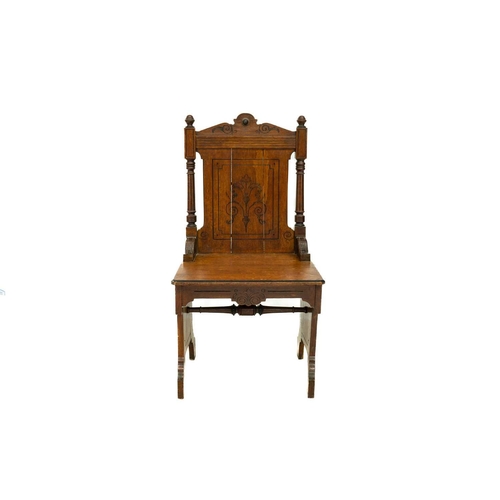 592 - A pair of late Victorian aesthetic movement oak side chairs. With incised panel backs, solid seats, ... 