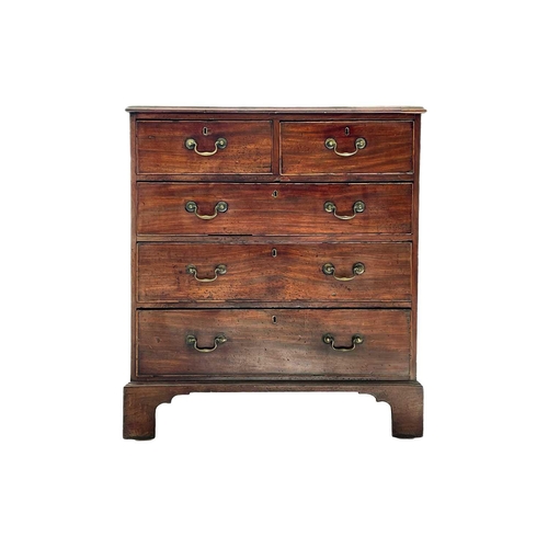 599 - A George III mahogany chest. Of two short and three long drawers, raised on bracket feet, height 106... 