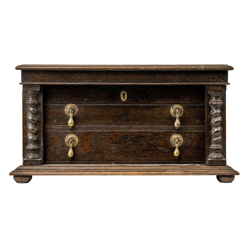 60 - An oak cased canteen of OE pattern cutlery 12 place settings ( a few deficient), in a two drawer cab... 