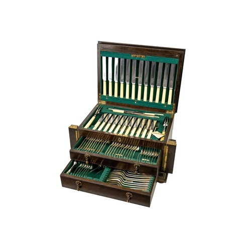 60 - An oak cased canteen of OE pattern cutlery 12 place settings ( a few deficient), in a two drawer cab... 