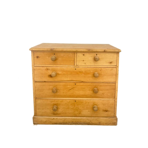 614 - A pine chest of two short and three long drawers. Circa 1900, on a plinth base, height 99cm, width 1... 