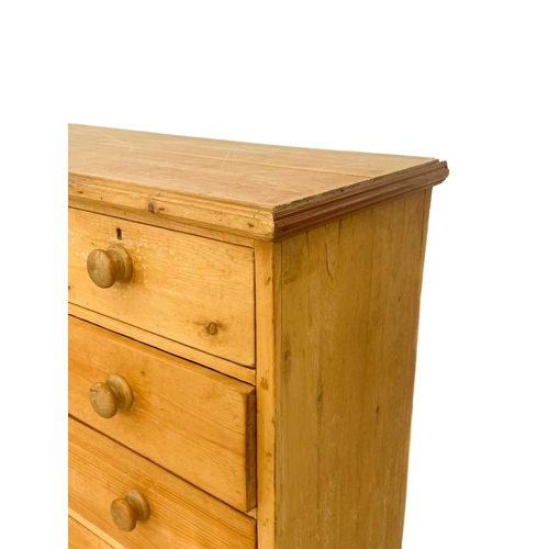 614 - A pine chest of two short and three long drawers. Circa 1900, on a plinth base, height 99cm, width 1... 