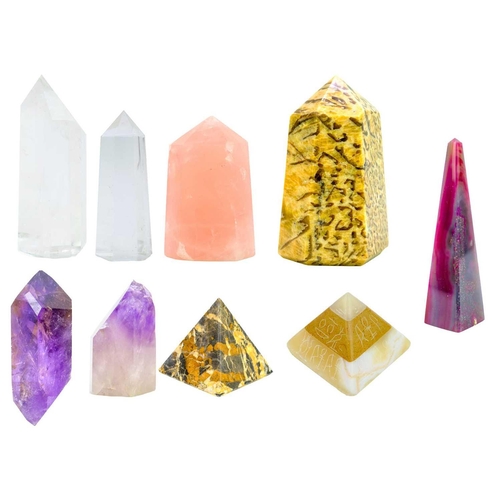 62 - A collection of cut and polished minerals. To include a large graphite point, 13cm high, 7cm wide, 6... 