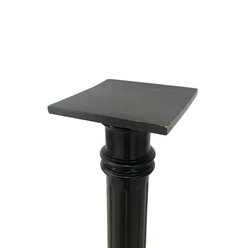 623 - An Edwardian ebonised pillar or torchere. With fluted column, height 106cm, together with a tripod w... 