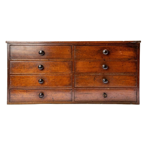 625 - A 19th century mahogany table or collector's cabinet. Fitted with eight drawers with turned handles,... 