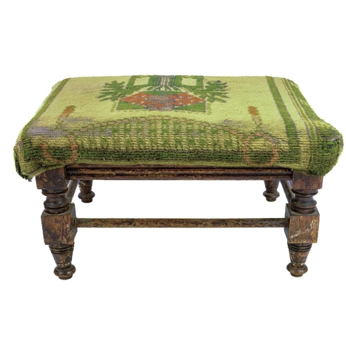 628 - A walnut frame footstool. Height 22cm together with another smaller footstool. (2)