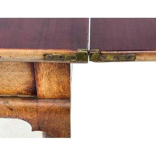 633 - An early George III mahogany fold top tea table. With angled protruding corners and fitted a frieze ... 