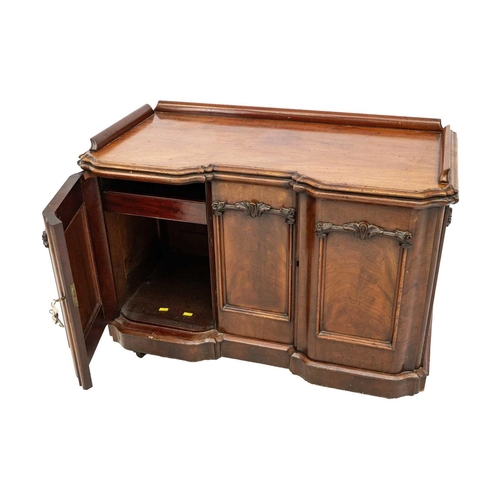 648 - A Victorian mahogany small cabinet/chiller. The top with ledge back above twin panel doors enclosing... 