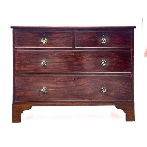 660 - A 19th century mahogany chest of drawers. With two short and two long drawers raised on bracket feet... 