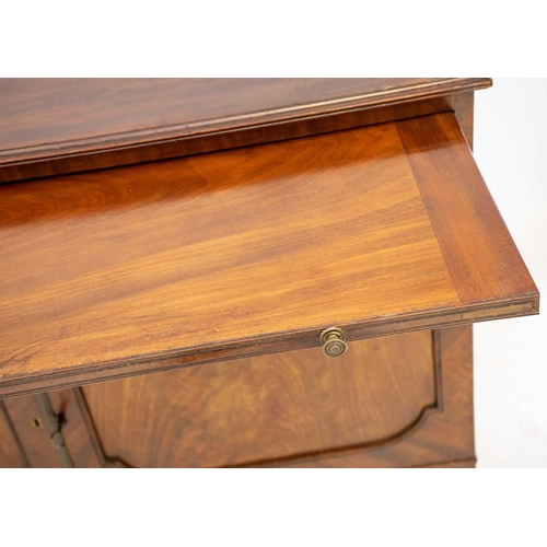 662 - A George III mahogany side cabinet/low press. Fitted with a pull-out slide above three drawers, all ... 